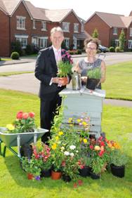Caption: (BNI) Mark Clare, Group Chief Executive of Barratt Developments with Jane Moseley, of the British Beekeepers Association